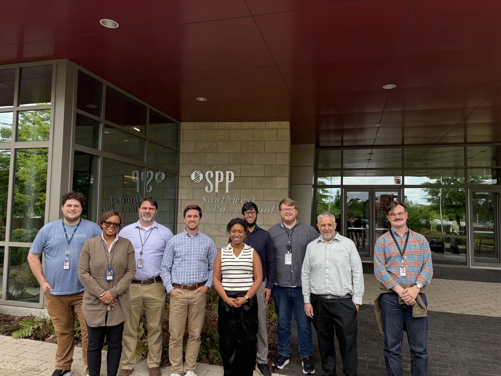 Subset of us with our SAS representatives on the SPP campus